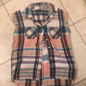 Sleeveless button down top